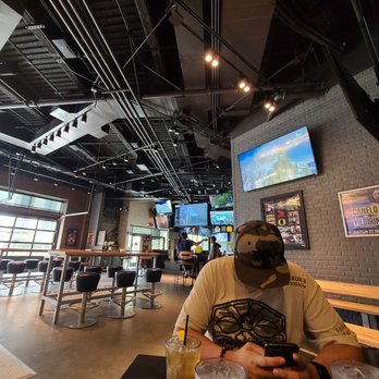 Buffalo Wild Wings - Inside seating area near bar - American Near Me - Honolulu, Hawaii Buffalo Wild Wings - Inside seating area near bar - American Near Me - Honolulu, Hawaii