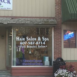 Alfred Hair & Tanning Center - Front window