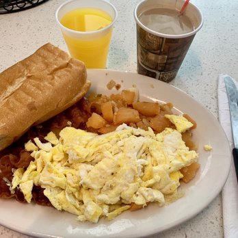 Rumba's Cafe - Two Eggs, Bacon, French fries, Toast with butter, Spanish Coffee and Orange Juice - Cuban Near Me - Jersey City, New Jersey Rumba's Cafe - Two Eggs, Bacon, French fries, Toast with butter, Spanish Coffee and Orange Juice - Cuban Near Me - Jersey City, New Jersey