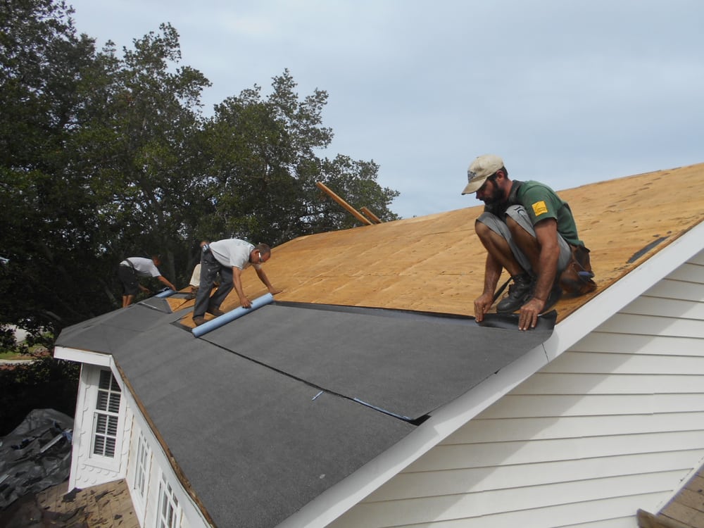 Slide of J K Behan Roofing