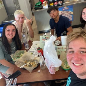 Tacos Jalisco - a group of people sitting around a table - Fast Food Near Me - Sarasota, Florida Tacos Jalisco - a group of people sitting around a table - Fast Food Near Me - Sarasota, Florida