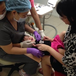 Children's Dental Center - Bear Hug method with the pediatric dentists