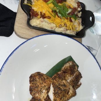 Lucky Shuck - Blackened mahi-mahi with a side of smashed loaded potatoes. - Seafood Near Me - Jupiter, Florida Lucky Shuck - Blackened mahi-mahi with a side of smashed loaded potatoes. - Seafood Near Me - Jupiter, Florida