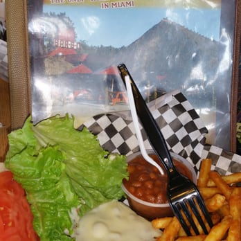 The Pit Bar-B-Q - Beef burger, season fries and yummy baked beans..  I never eat bake beans but these were awesome.. - Barbeque Near Me - Miami, Florida