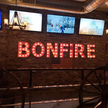 Bonfire Country Bar - a brick wall with neon signs - Bars Near Me - Manchester, New Hampshire Bonfire Country Bar - a brick wall with neon signs - Bars Near Me - Manchester, New Hampshire