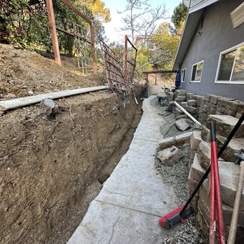Erick’s Landscaping - Digging for new wall base - Landscaping Near Me