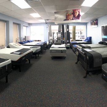 Rodenbaugh's Flooring America Kitchen Bed and Bath - a room full of beds - Appliances Near Me - Allen, Texas Rodenbaugh's Flooring America Kitchen Bed and Bath - a room full of beds - Appliances Near Me - Allen, Texas