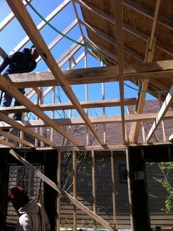 Slide of Rowe's Roofing