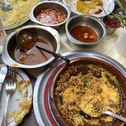 Vegetable couscous and the beef meatball egg tagine (bottom one)