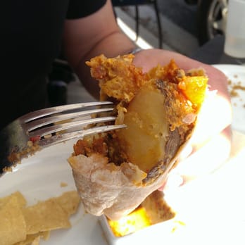 Cafe Topes - Chorizo and egg breakfast burrito.  Check out that HUGE chunk of potato! - Coffee & Tea Near Me - Carlsbad, California