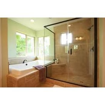 J Clark Construction - a large bathroom with a walk in shower - Glass & Mirrors Near Me J Clark Construction - a large bathroom with a walk in shower - Glass & Mirrors Near Me
