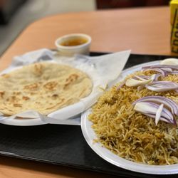 Saigruha Indian Restaurant and Grocery - Chicken Biryani w/Naan and mango Frooti drink.