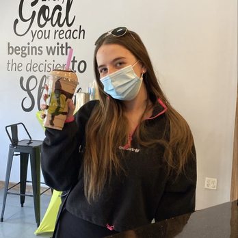 Full nutrition - a woman wearing a face mask and holding a bag of food - Coffee & Tea Near Me - Glen Cove, New York Full nutrition - a woman wearing a face mask and holding a bag of food - Coffee & Tea Near Me - Glen Cove, New York