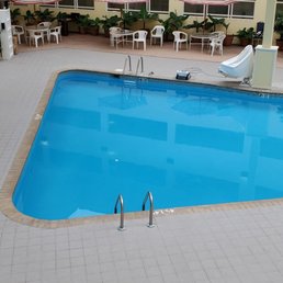 There is a pool in the center of the rooms. Kinda old school, kids will enjoy it. There is a pool in the center of the rooms. Kinda old school, kids will enjoy it.