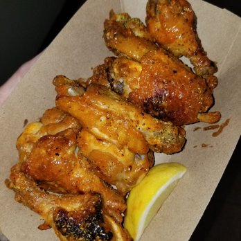 Pie95 Pizza - Wings tossed in hot, curry and lemon pepper. - Pizza Near Me - Jacksonville, Florida