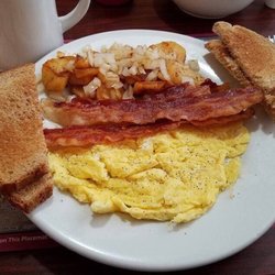 Marika's Place - 2 scrambled eggs, home fries with onions, bacon an wheat toast. Coffee.
