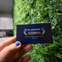 Dr Goldberg & Associates - Business card and logo