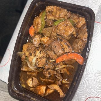 Le Terrace Lounge - Jerk pork in sauce - Lounges Near Me - Pompano Beach, Florida