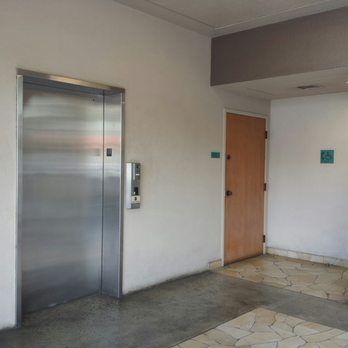 Airport Trade Center - Entrance to elevator and restroom - Shopping Centers Near Me - Honolulu, Hawaii