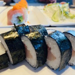 Hamachi Maki roll (not listed on menu), San Antonio roll and half order of mixed sashimi in the background.