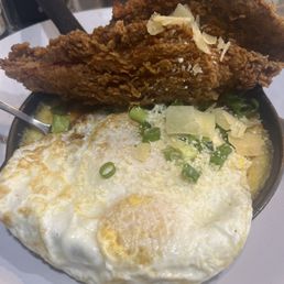 Fish & Grits with 2 Eggs Over Easy. Excellent dish. Fish & Grits with 2 Eggs Over Easy. Excellent dish.