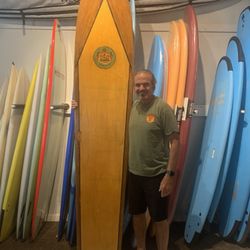 Surf City Surf Shop - A real jewel. Wooden Aloha surfboard. This is a 1950's board. Made completely out of wood. I never seen one like this before.