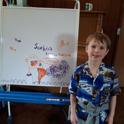 Amigos De Palo Alto - One of students showing off his wonderful art!
