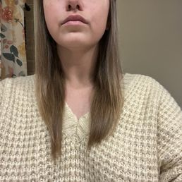 One side was completely hacked off. only asked for an inch to be cut max. She cut well over 2 off the one side.