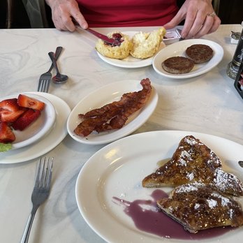 Blueberry Muffin - Biscuit and sausage, upper center, strawberries, bacon and french toast round out a good breakfast. - Breakfast & Brunch Near Me - Indialantic, Florida