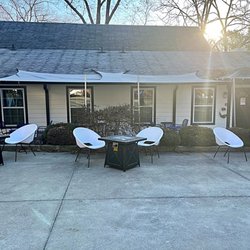 Alma Coffee - Outdoor seating with firepit tables.