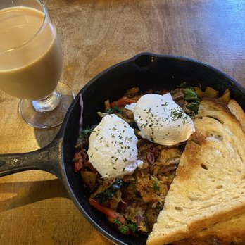 Nate's Garden Grill - Pulled pork hash and poached eggs. Nitro brew coffee on the side. - American Near Me - San Diego, California