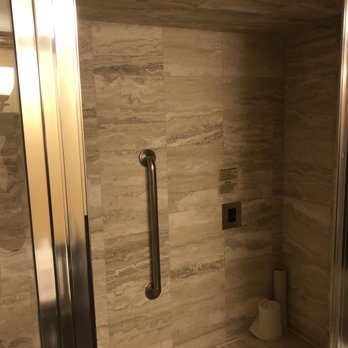 Peppermill Reno - Walk-in shower with bench seat and steam room capacity. - Casinos Near Me - Reno, Nevada
