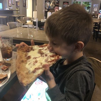 Zombie Bob's Pizza - My younger son figured it out! Just pick it up and start munching! - Pizza Near Me - Charleston, South Carolina