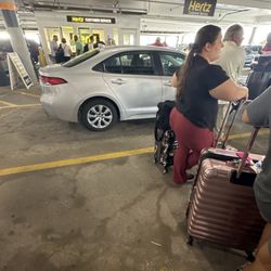 Hertz Rent A Car - AT LEAST 10-15 waiting with one person at the window