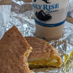 Daily Rise - Fresh egg and cheese panini with Iced Oat milk Latte