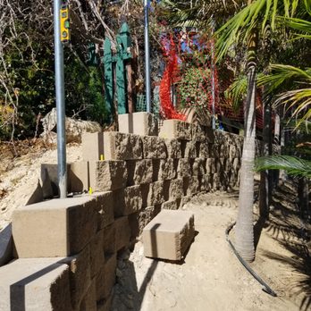 Murillo Landscape - Difficult step down of wall and fence requiring many cuts of block topper. - Masonry/Concrete Near Me - Escondido, California Murillo Landscape - Difficult step down of wall and fence requiring many cuts of block topper. - Masonry/Concrete Near Me - Escondido, California