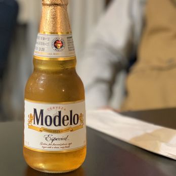 Max’s Cafe - a modelo beer bottle on a table - American Near Me - Tilden, Texas Max’s Cafe - a modelo beer bottle on a table - American Near Me - Tilden, Texas