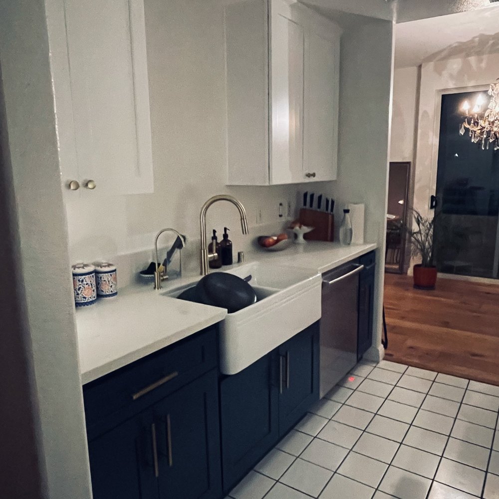 Kitchen Remodeling By Ferney - a white kitchen with blue cabinets - General Contractors Near Me - Los Angeles, California