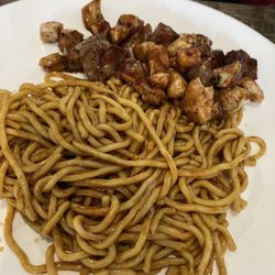 Koi Asian Fusion Restaurant - Hibachi chicken and streak noodles Dinner plate