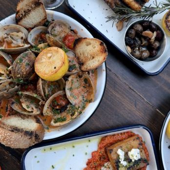 Lost Isle - Crispy polenta, fire roasted clams, olives - Cocktail Bars Near Me - Johns Island, South Carolina Lost Isle - Crispy polenta, fire roasted clams, olives - Cocktail Bars Near Me - Johns Island, South Carolina