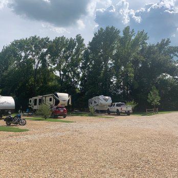 Wagon Train RV Park - Shaded RV sites with full hookups and wide gravel roads that make driving and parking easy for big rigs and towables. - RV Parks Near Me - Canton, Texas