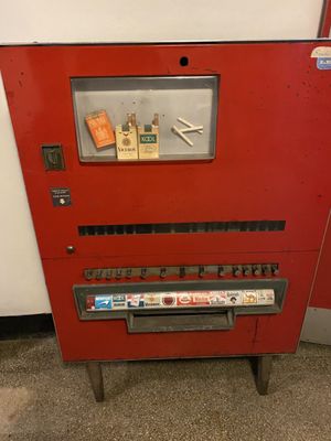 Photo of Atomic Bowl Duckpin - Indianapolis, IN, US. Decor, old cigarette machine vending