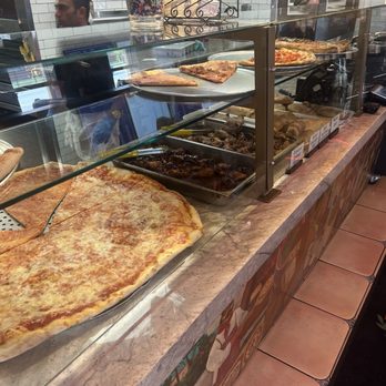 Vinny's Cafe - Oversize pizza slices! - Italian Near Me - Baltimore, Maryland