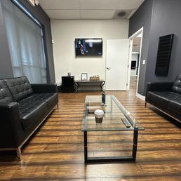 Waiting area complete with streaming TV, snacks and drinks.