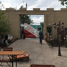 a man standing in front of a food truck