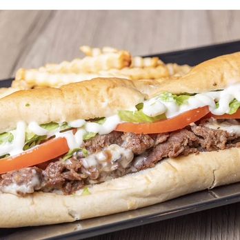 Faimus Wings - Ultimate Philly Cheesesteak - Chicken Wings Near Me - Belle Glade, Florida