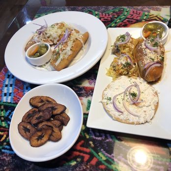 El Rinconcito Chapin - Doblada plate on upper left, Chapincito plate on right, with the fried plaintains included - Latin American Near Me - Austin, Texas