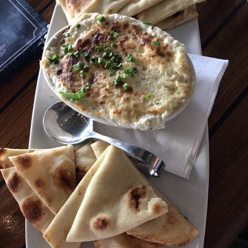 Poseidon - Hot crab dip with warm pita bread - Seafood Near Me - Hilton Head Island, South Carolina Poseidon - Hot crab dip with warm pita bread - Seafood Near Me - Hilton Head Island, South Carolina