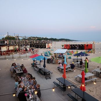 The Deck - Stage and seat seating area - American Near Me - Muskegon, Michigan