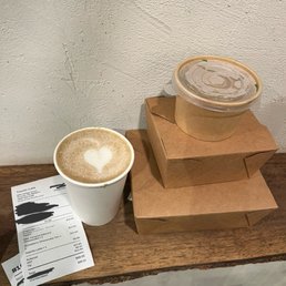 hojicha latte  taro miso 2 takeout boxes with onigiri and cheesecake